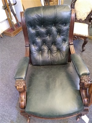 Lot 31 - A William IV mahogany and green buttoned leather library chair