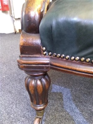 Lot 31 - A William IV mahogany and green buttoned leather library chair