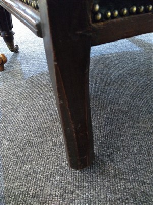 Lot 31 - A William IV mahogany and green buttoned leather library chair