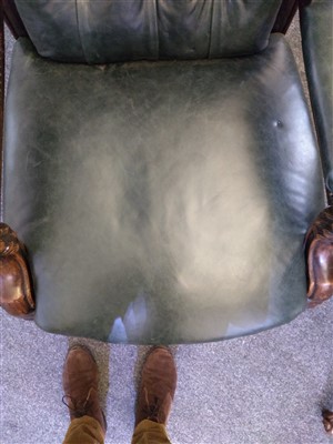 Lot 31 - A William IV mahogany and green buttoned leather library chair