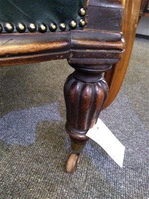 Lot 31 - A William IV mahogany and green buttoned leather library chair