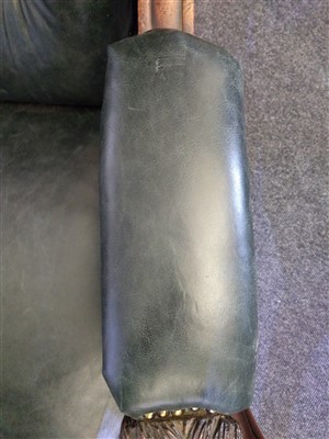 Lot 31 - A William IV mahogany and green buttoned leather library chair