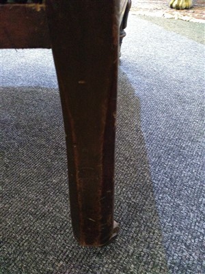 Lot 31 - A William IV mahogany and green buttoned leather library chair