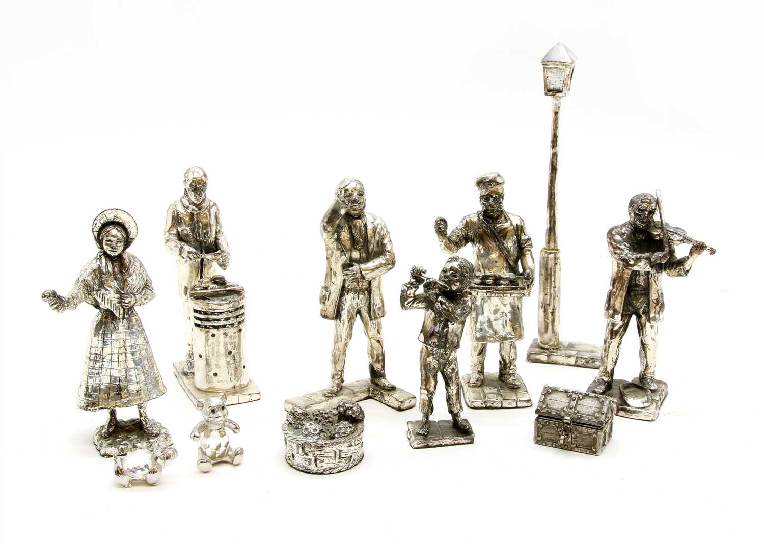 Lot 101 - A collection of silvered figures