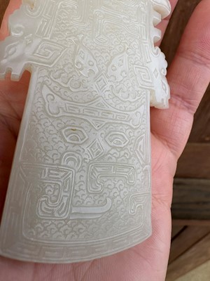 Lot 64 - A Chinese jade plaque