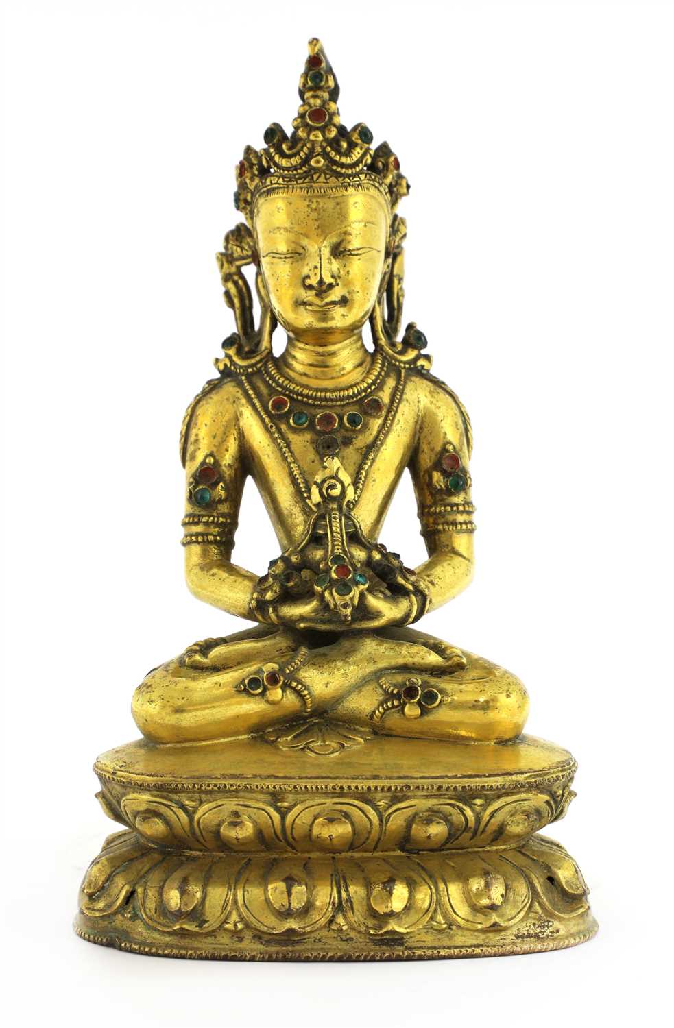 Lot 121 - A Tibetan gilt bronze bodhisattva
