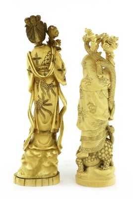 Lot 129 - Two Japanese carved ivory figures