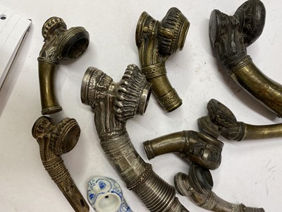 Lot 2 - Nine Burmese clay or metal pipe bowls