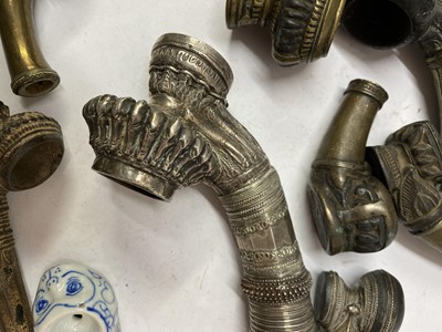 Lot 2 - Nine Burmese clay or metal pipe bowls