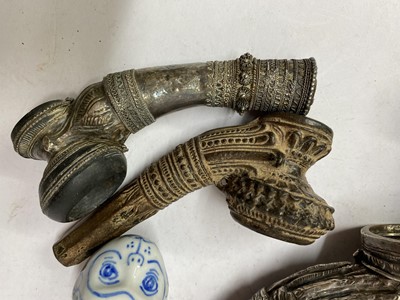 Lot 2 - Nine Burmese clay or metal pipe bowls