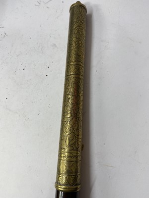 Lot 67 - A Chinese wood and brass-mounted opium pipe