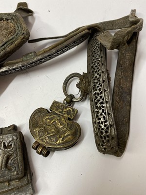 Lot 12 - Three Tibetan leather tinder pouches or chuckmucks