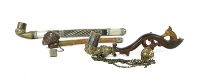 Lot 14 - Three Persian pipes