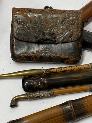 Lot 25 - Three Japanese smoking sets, kiseruzutsu (pipecase) with kiseru and tabako-ire (tobacco pouch)