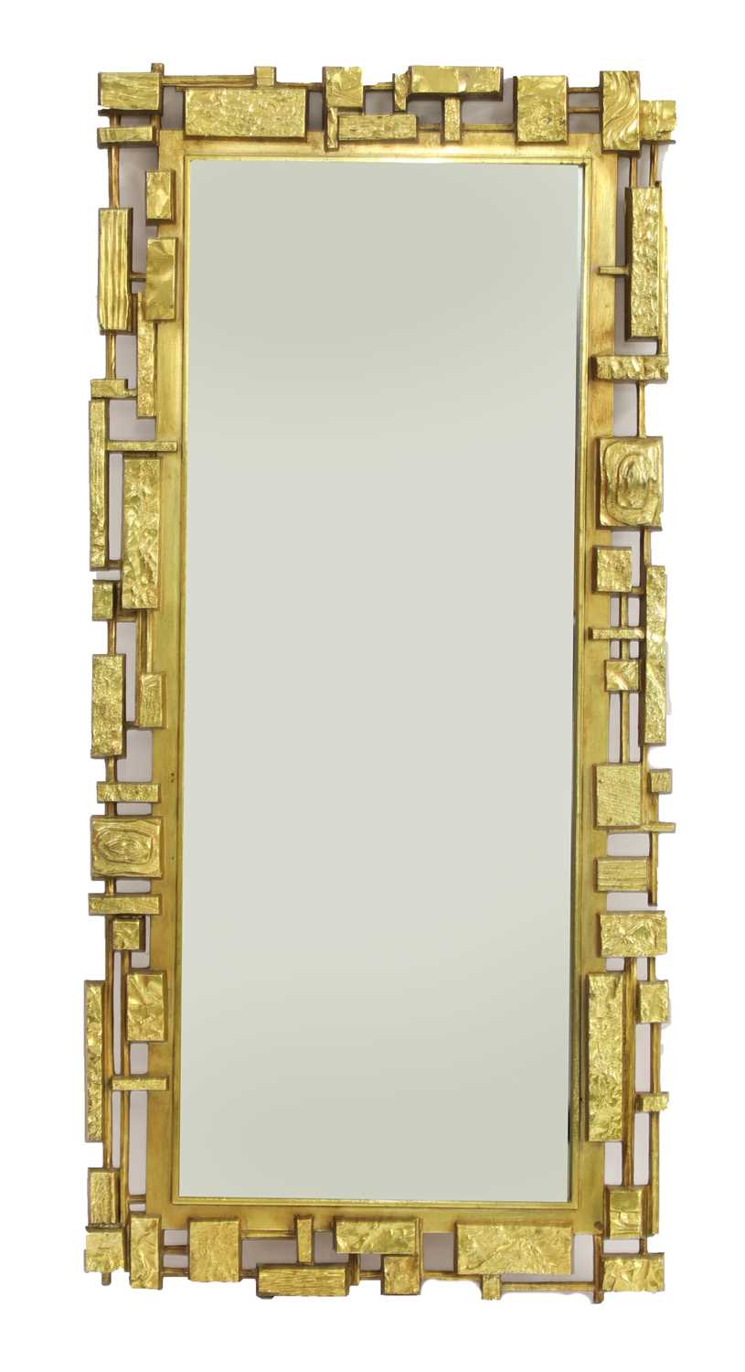 Lot 428 - A Syroco brutalist wall mirror