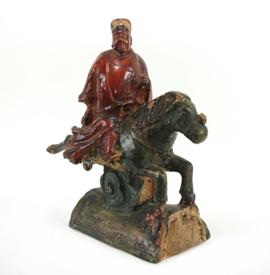 Lot 101 - A Chinese pottery roof tile