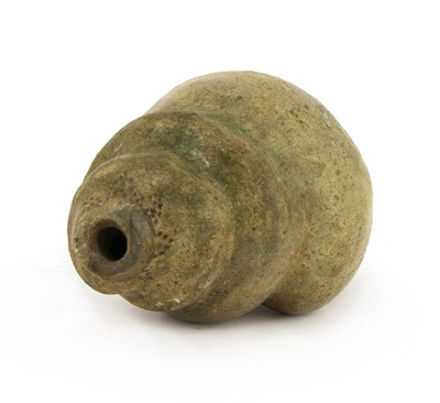 Lot 70 - A Chinese green glazed stoneware shell