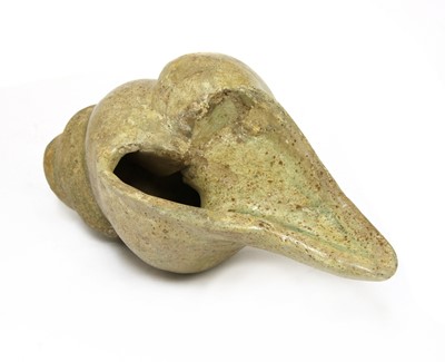 Lot 70 - A Chinese green glazed stoneware shell