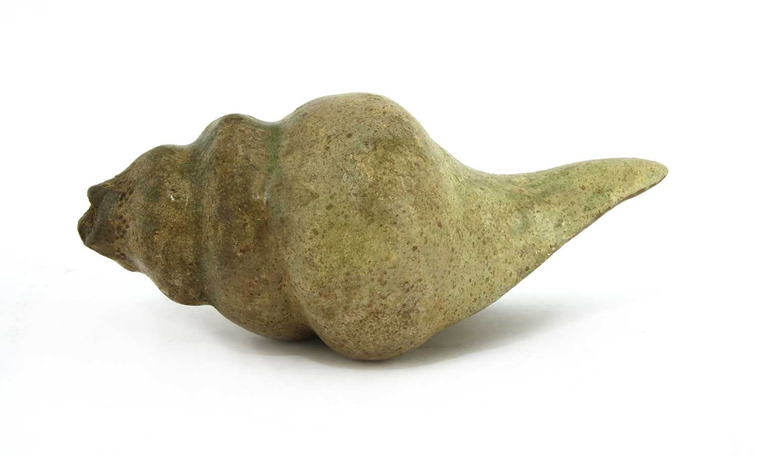 Lot 70 - A Chinese green glazed stoneware shell