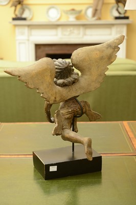 Lot 118 - A carved wooden polychrome and gilt-decorated figure of an angel