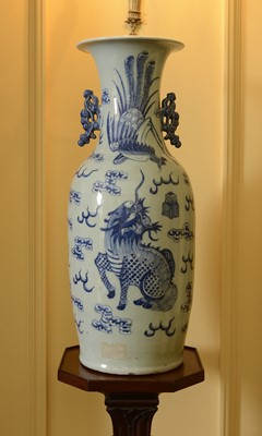 Lot 102 - A near pair of celadon-glazed vases