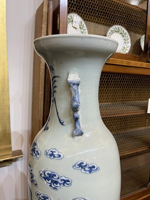 Lot 102 - A near pair of celadon-glazed vases