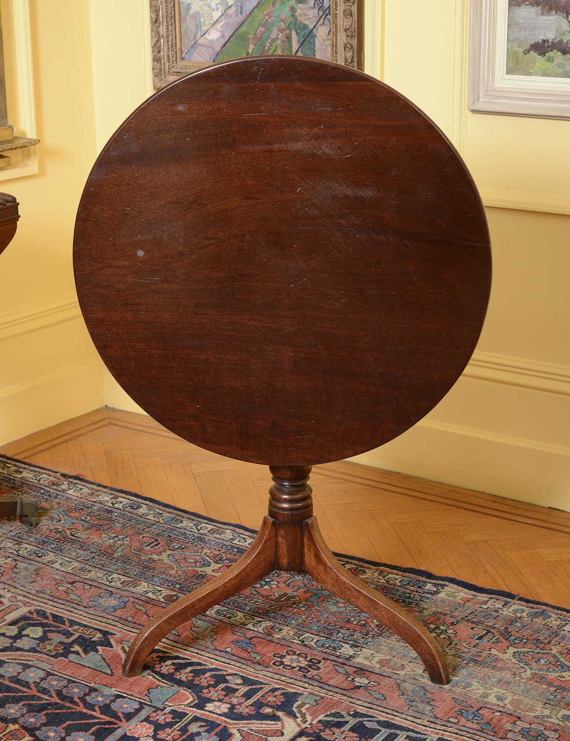 Lot 112 - A George III mahogany tilt-top supper table