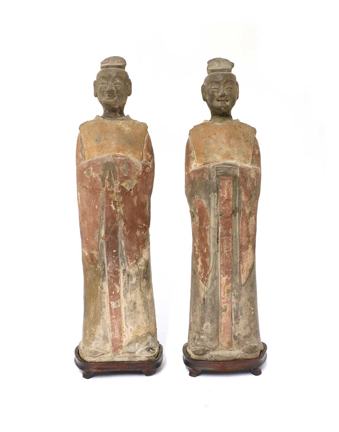 Lot 15 - A pair of Chinese pottery figures