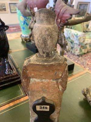 Lot 15 - A pair of Chinese pottery figures