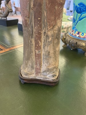 Lot 15 - A pair of Chinese pottery figures