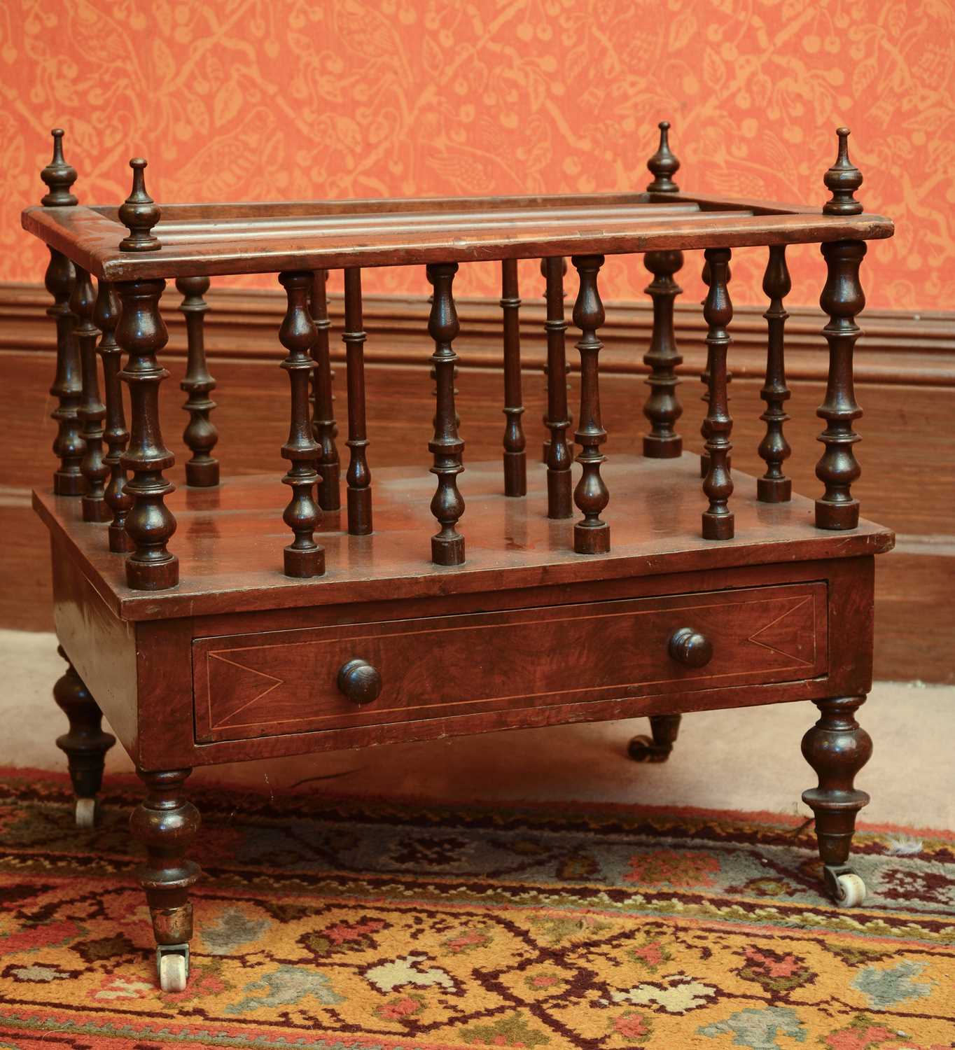 Lot 194 - A Victorian walnut canterbury