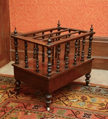 Lot 194 - A Victorian walnut canterbury
