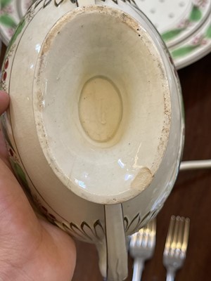 Lot 140 - A large Reilly creamware part dinner service