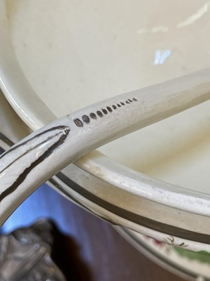 Lot 140 - A large Reilly creamware part dinner service
