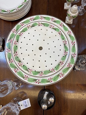 Lot 140 - A large Reilly creamware part dinner service