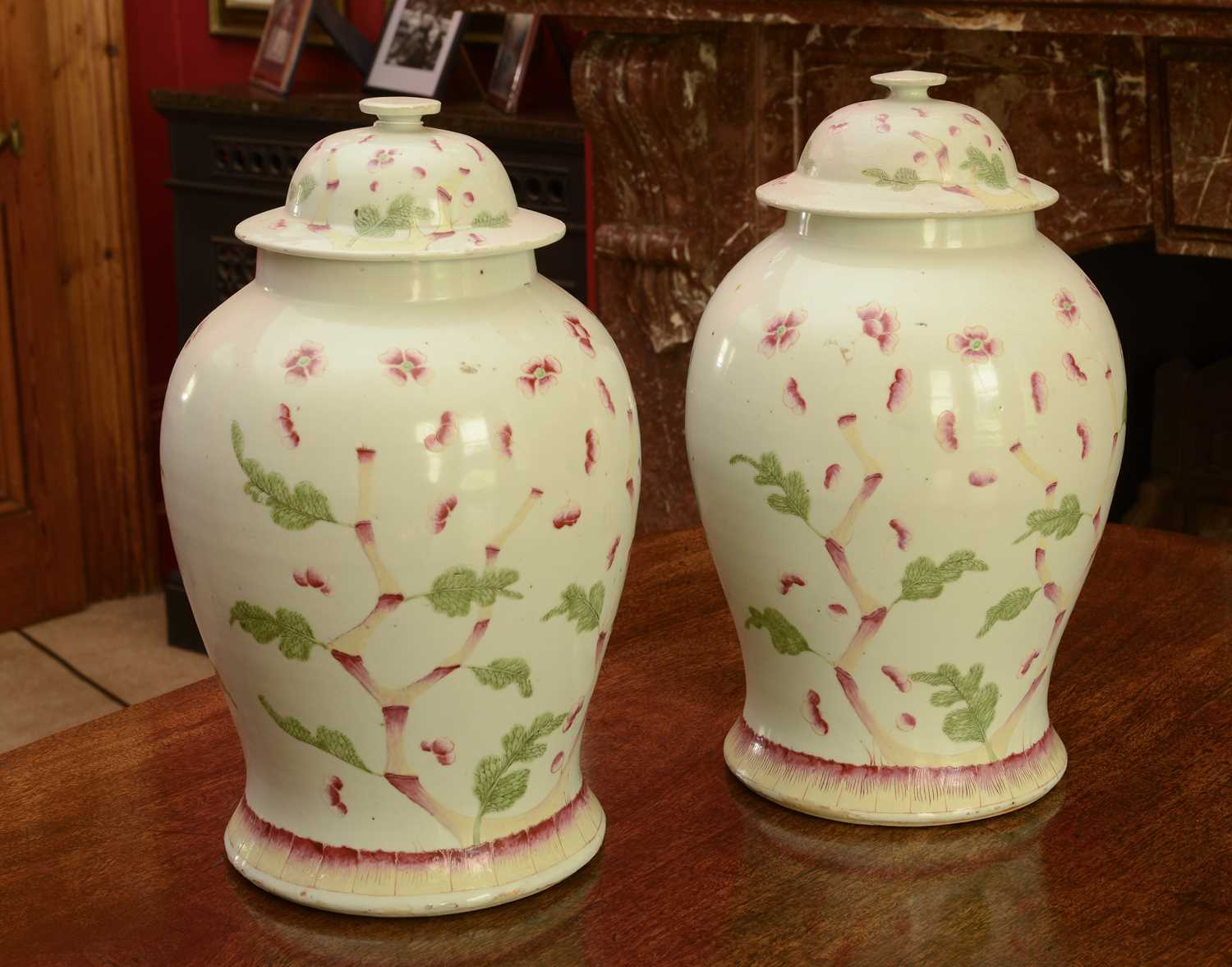 Lot 126 - A pair of Chinese porcelain baluster vases and covers
