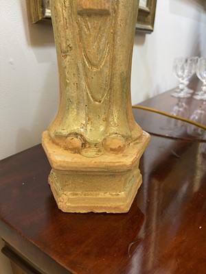 Lot 128 - A pair of Chinese Tang dynasty glazed terracotta burial figures (minggi)