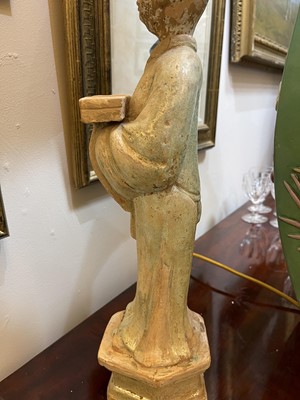 Lot 128 - A pair of Chinese Tang dynasty glazed terracotta burial figures (minggi)