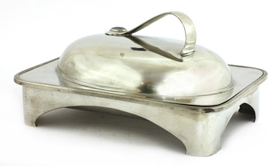 Lot 60 - An Arts and Crafts pewter muffin dish and cover