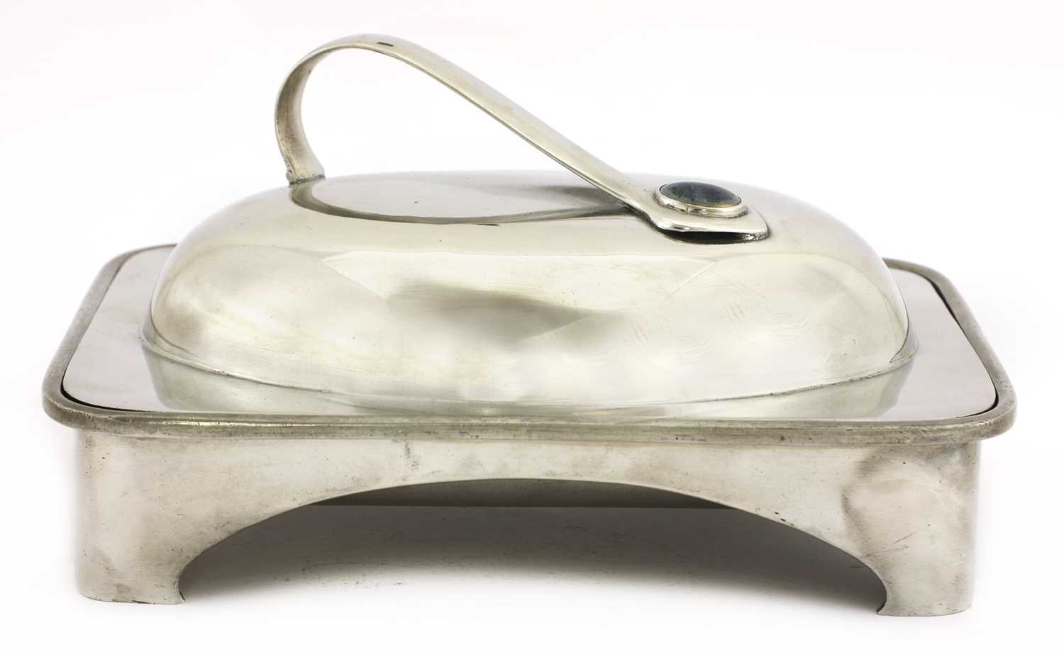 Lot 60 - An Arts and Crafts pewter muffin dish and cover