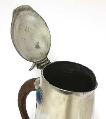 Lot 59 - A Liberty Tudric pewter and enamel jug