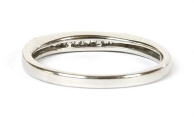 Lot 89 - A white gold diamond half eternity ring