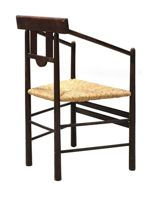 Lot 92 - An Arts and Crafts oak armchair