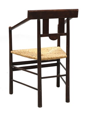 Lot 92 - An Arts and Crafts oak armchair
