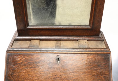 Lot 437 - A diminutive oak dressing bureau