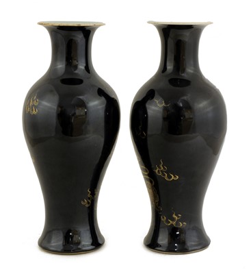 Lot 27 - A pair of Chinese black-glazed vases