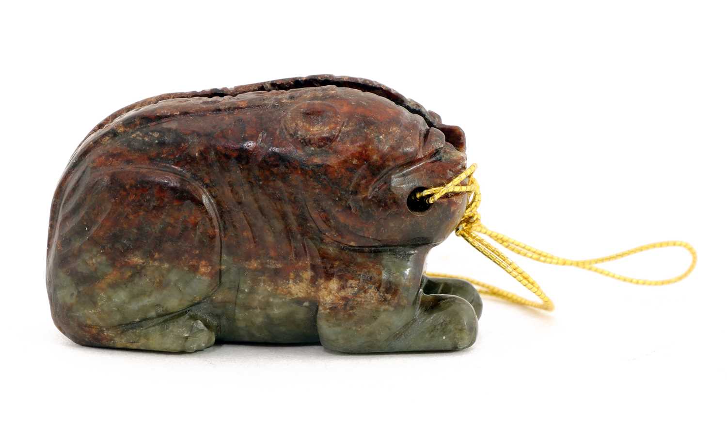 Lot 106 - A Chinese inscribed jade 'tiger' tally