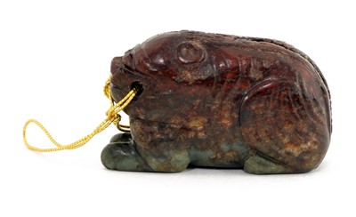 Lot 106 - A Chinese inscribed jade 'tiger' tally
