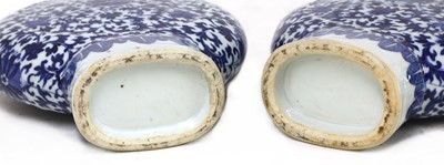 Lot 16 - A pair of Chinese blue and white moon flasks