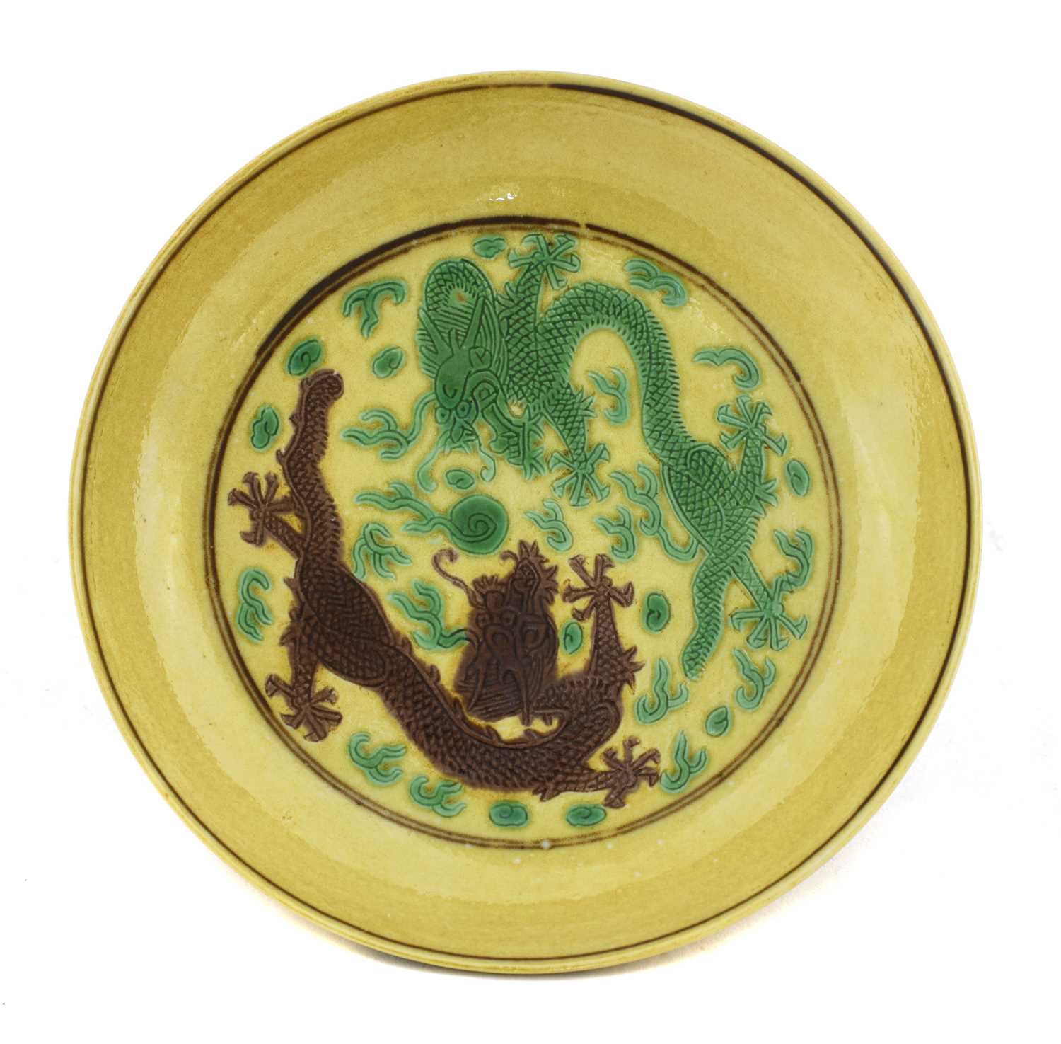 Lot 44 - A Chinese Imperial porcelain sancai saucer dish